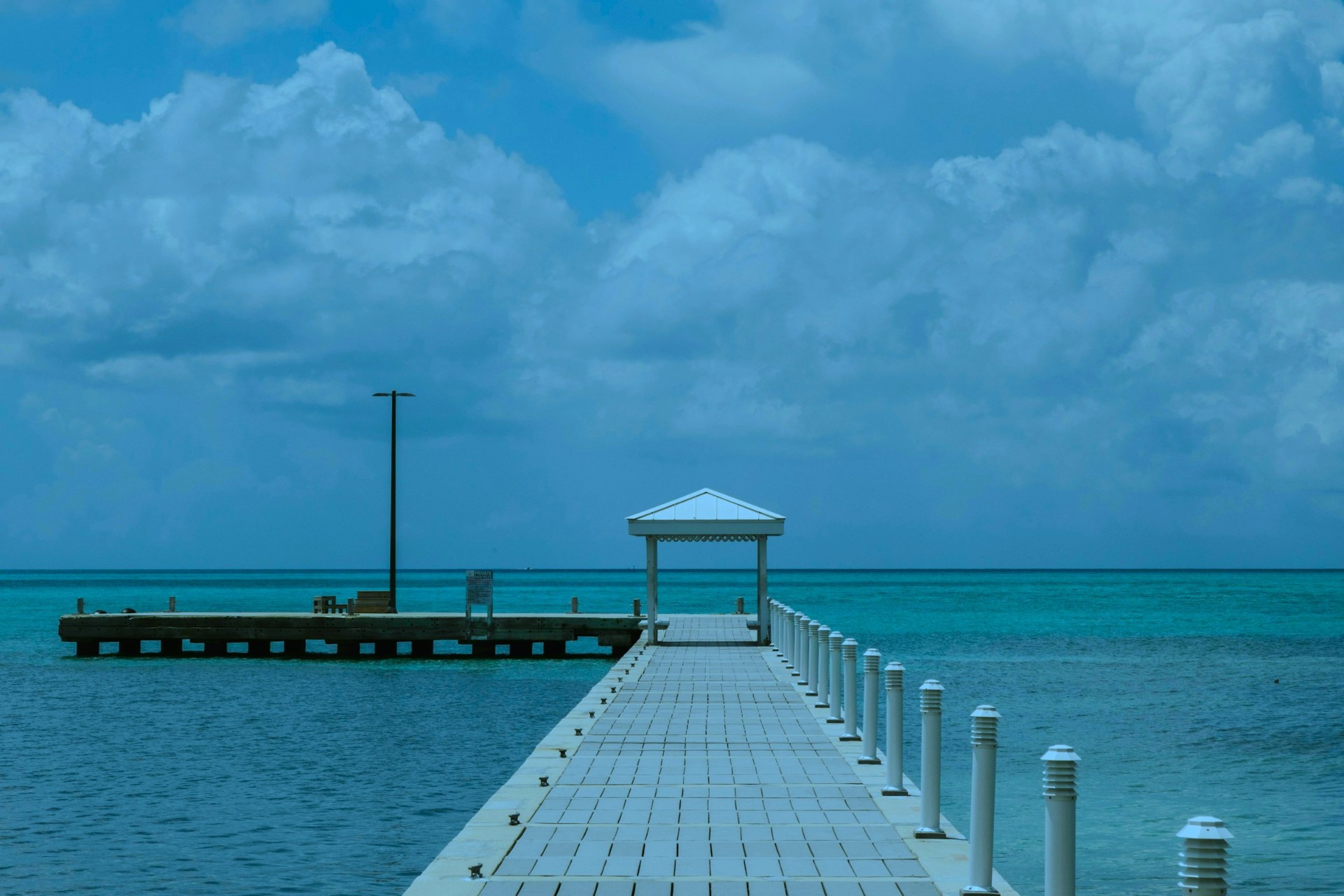 Pier extending into the Caribbean Sea, Cayman Islands